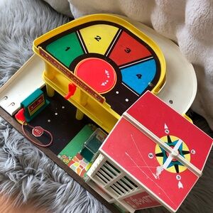 Fisher-Price Vibrant Garage Playset with Red and Yellow